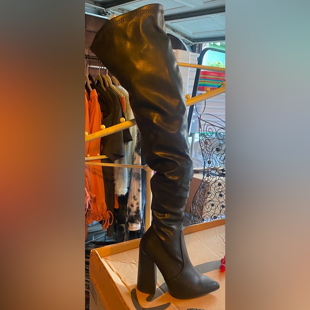 Over the knee high boots with blocked heel and pointed toe